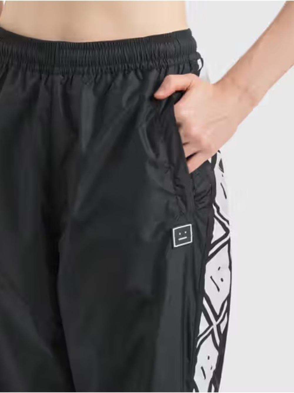 Acne Studios black face motif stripe trackpants